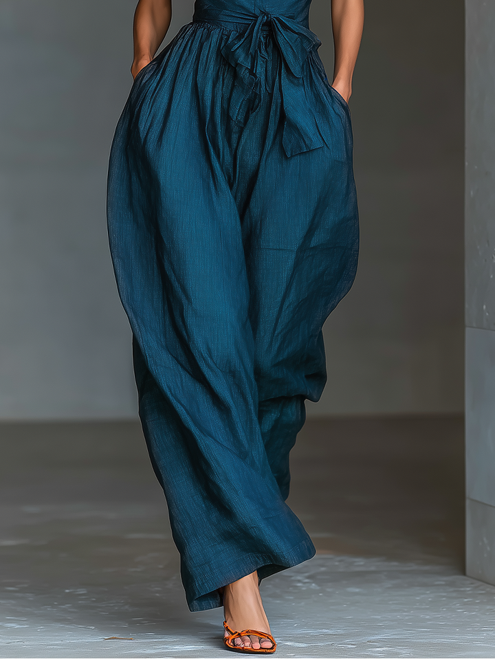 Solène – Crossover Strappy Navy Linen Jumpsuit